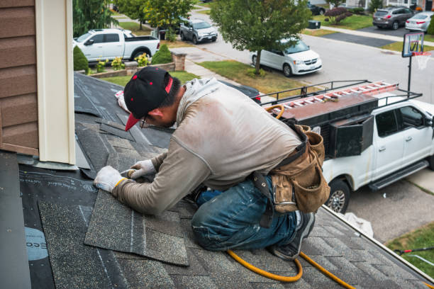 Professional Roofing technician working in South Hill, NY